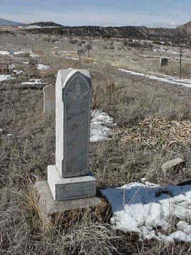 Divide Creek Cemetery and Joseph King gravestone.  (c) La33ey