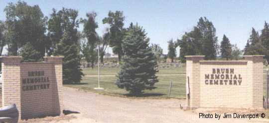 Gate from the north side of the highway which runs thru the center of the cemetery.